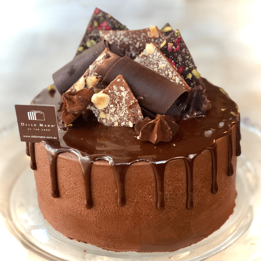 Indulge in Pure Decadence: Discover Dello Mano's Divine Chocolate Mousse Cake - Dello Mano