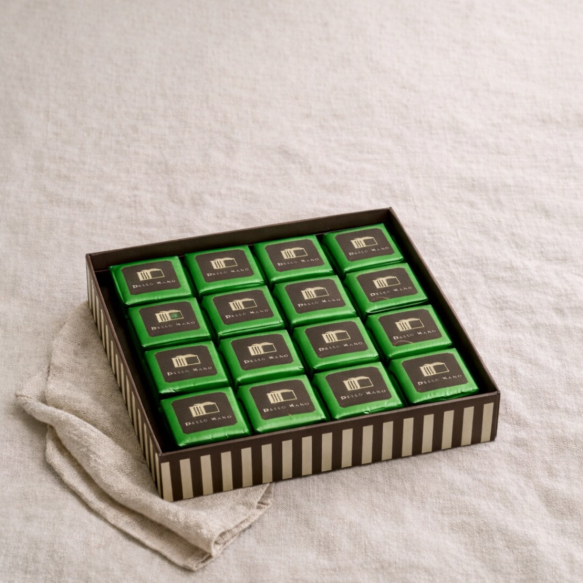 Dello Mano luxury brownie gift box with green foil wrapped vegan handmade brownies
