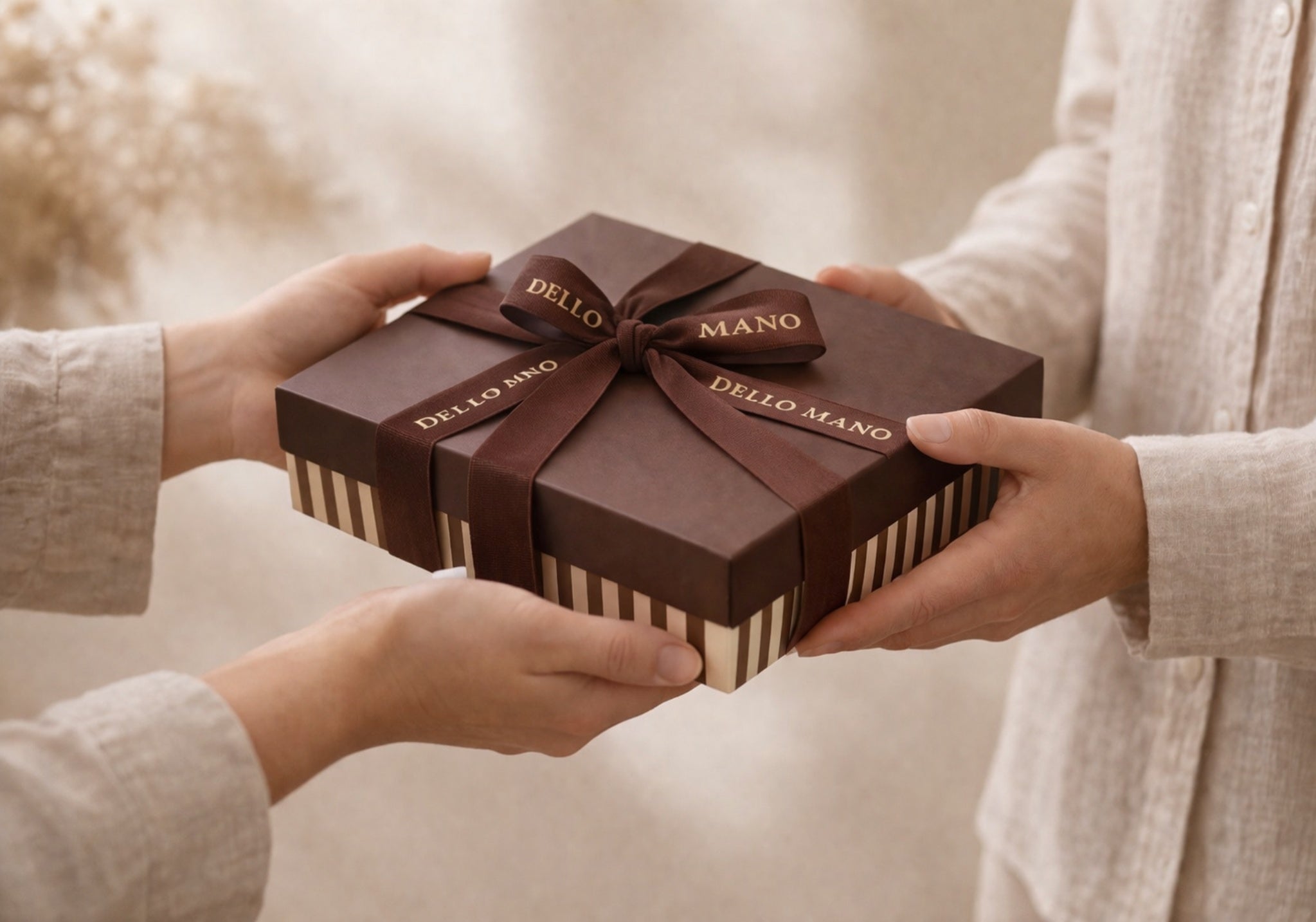 Gifting a brownie gift box with ribbon as a thoughtful brownie gift on a soft neutral background