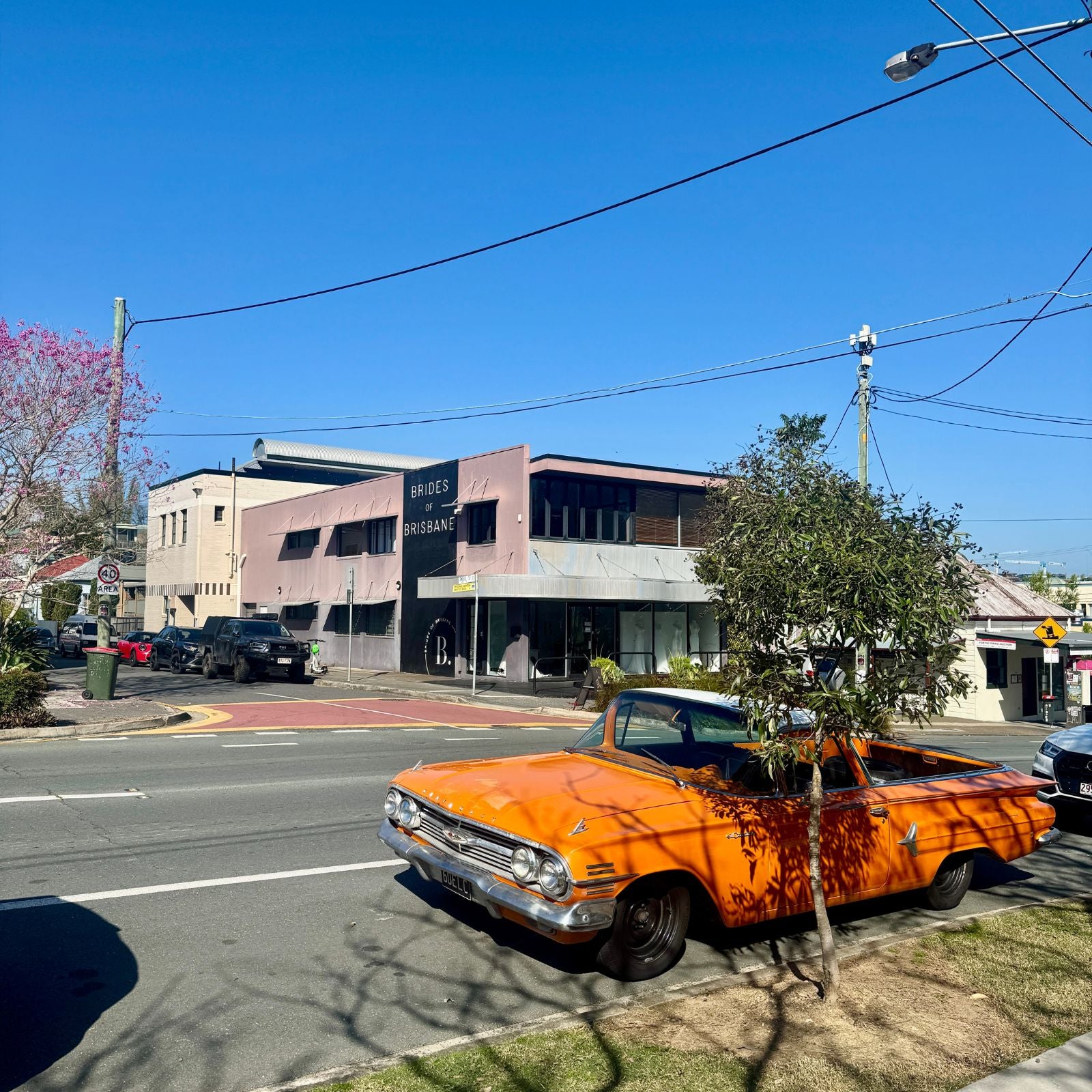 Paris Street corner in West End Brisbane near Dello Mano Kitchen Store – local landmark for handmade brownies and cakes