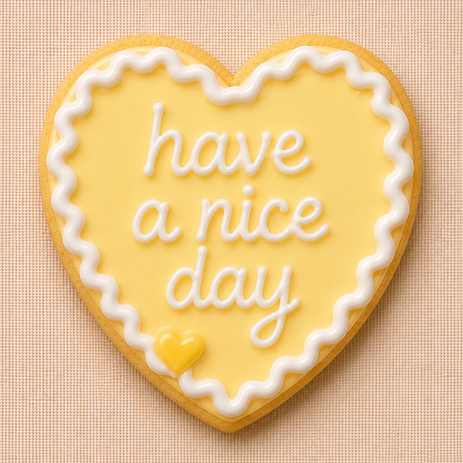 Pastel lemon “Have a Nice Day” heart cookie - handmade by Dello Mano
