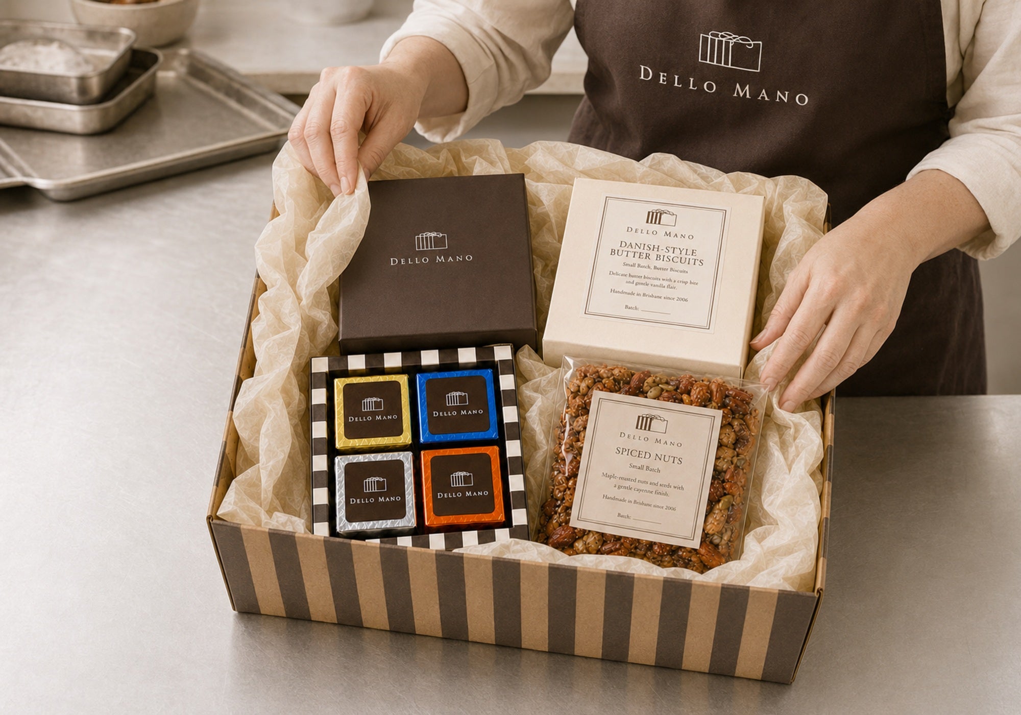 The Little Handmade Hamper being packed by hand in Brisbane with mixed brownies, Danish Butter Biscuits and Dello Mano spiced nuts.