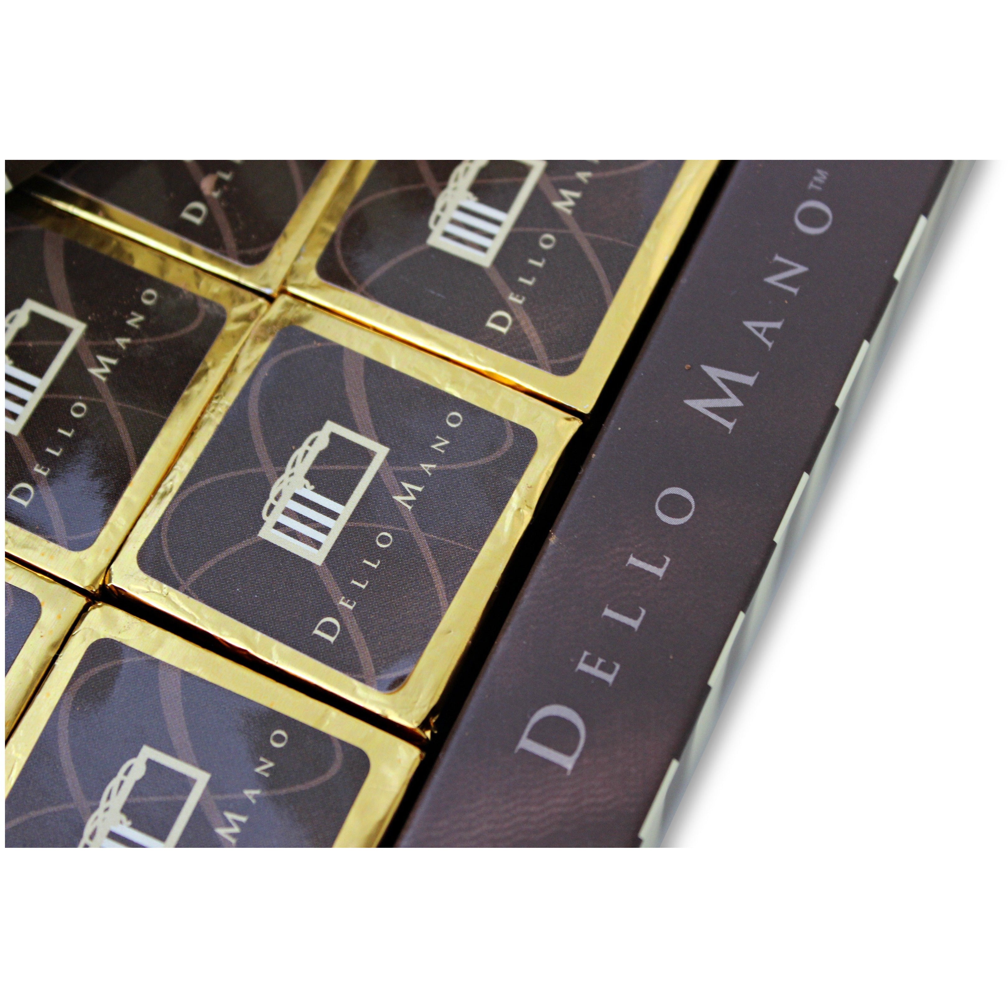 Luxury Brownie Gift Box Cross Selection of foiled Brownie cubes . The brown chocolate box has the words Dello Mano
