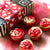 Valentine Cupcakes in red and white in front of a Valentine Gift Box