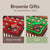 Side-by-side view of Dello Mano’s gluten friendly and vegan brownie gift boxes, wrapped in red and green foil, for inclusive luxury gifting