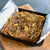 A tray of just baked Pumpkin Brownie- swirls of chocolate brownie and pumpkin brownie
