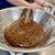 Freshly mixed small batch brownie batter in a stainless steel bowl at the Dello Mano kitchen, ready to be poured and baked.