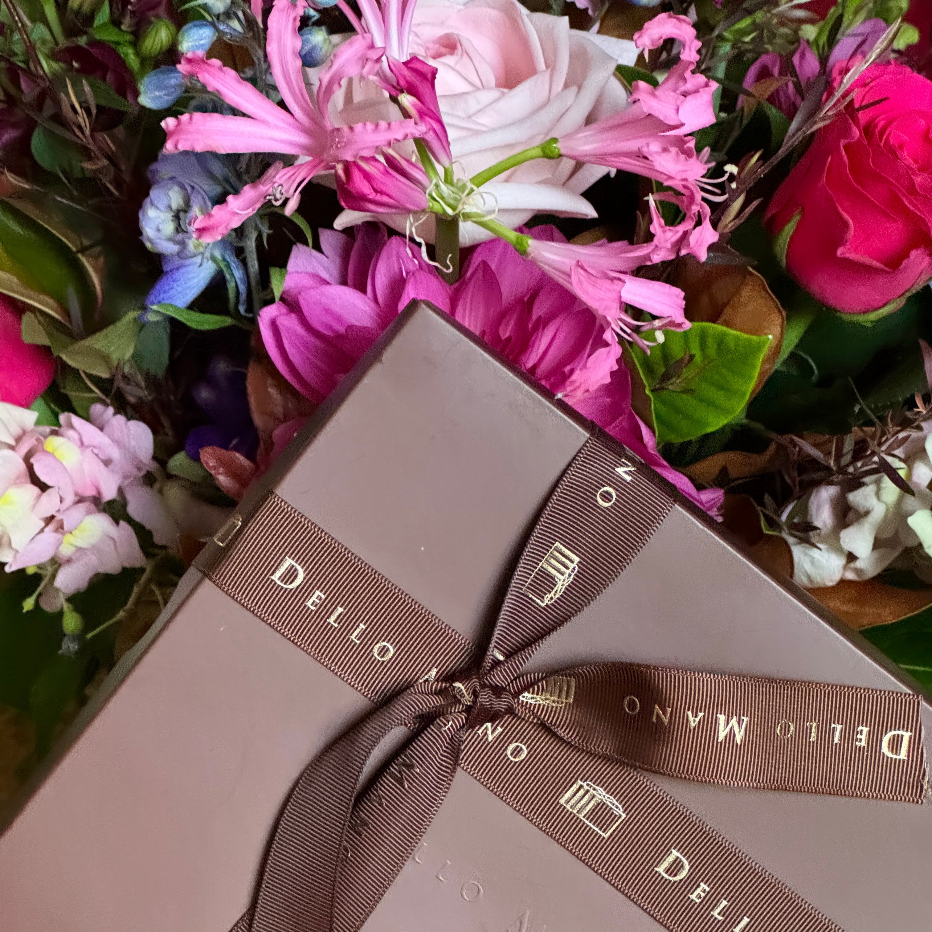 Dello Mano handmade brownies with fresh flowers, the perfect gift combination.