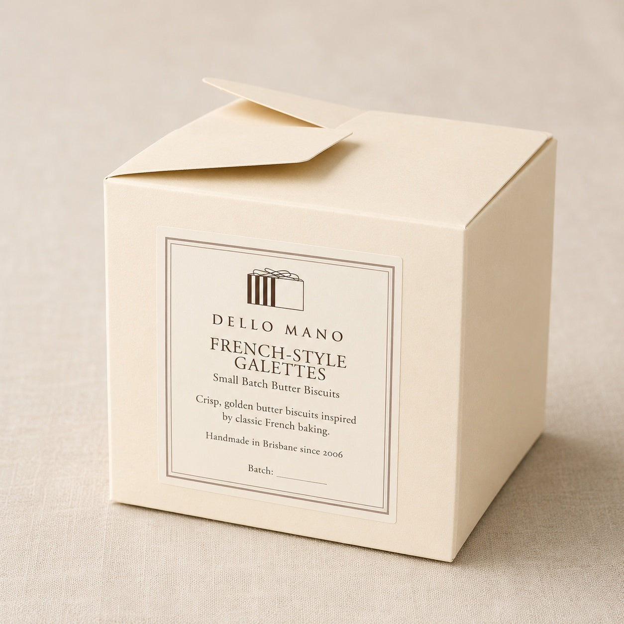 Dello Mano French-Style Galettes gift box in warm cream packaging with premium label