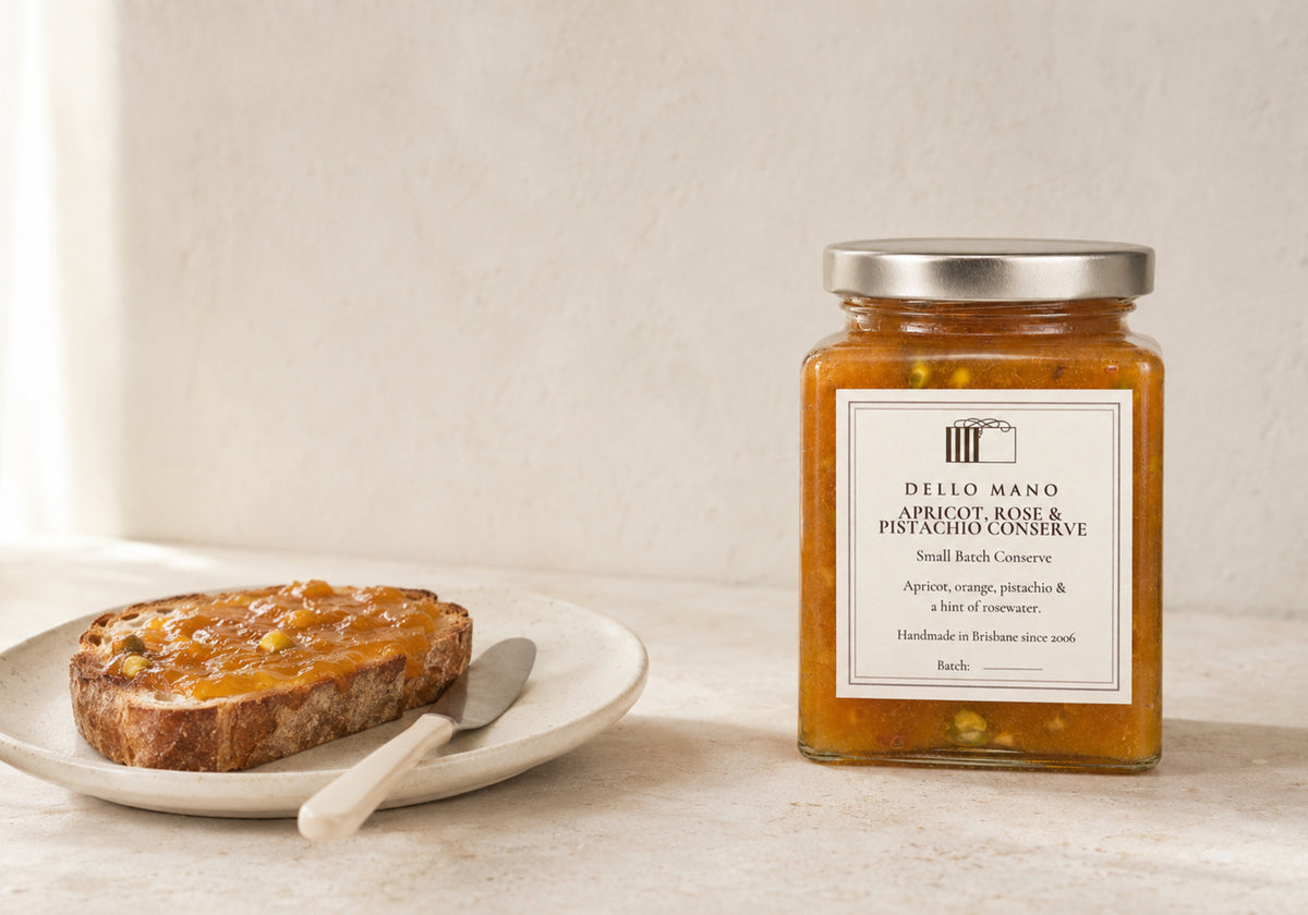 Dello Mano Apricot, Rose and Pistachio Conserve styled with pistachios on natural linen