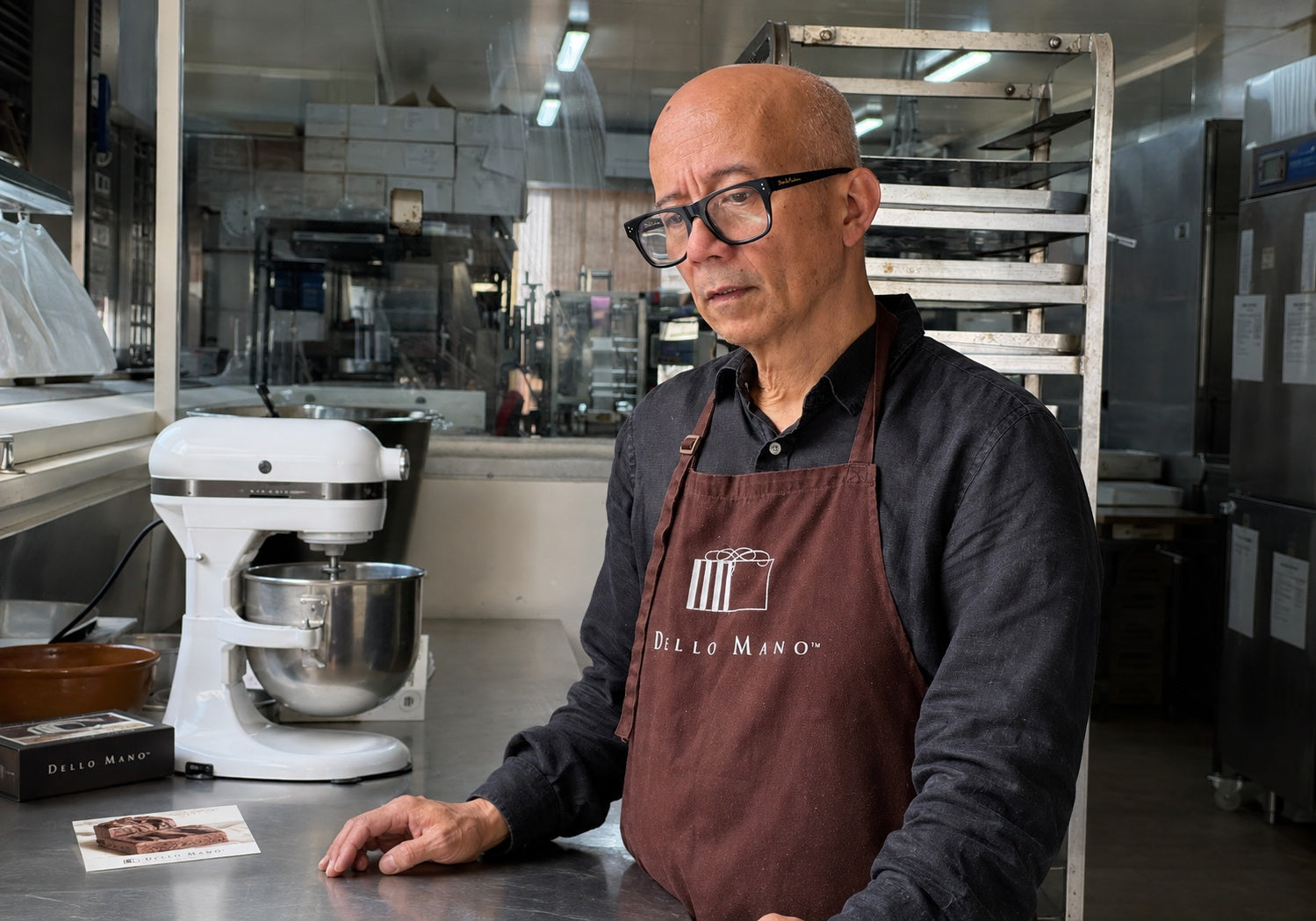 Dello Mano co-founder Bien in the Brisbane kitchen where Melbourne chocolate gifts are prepared