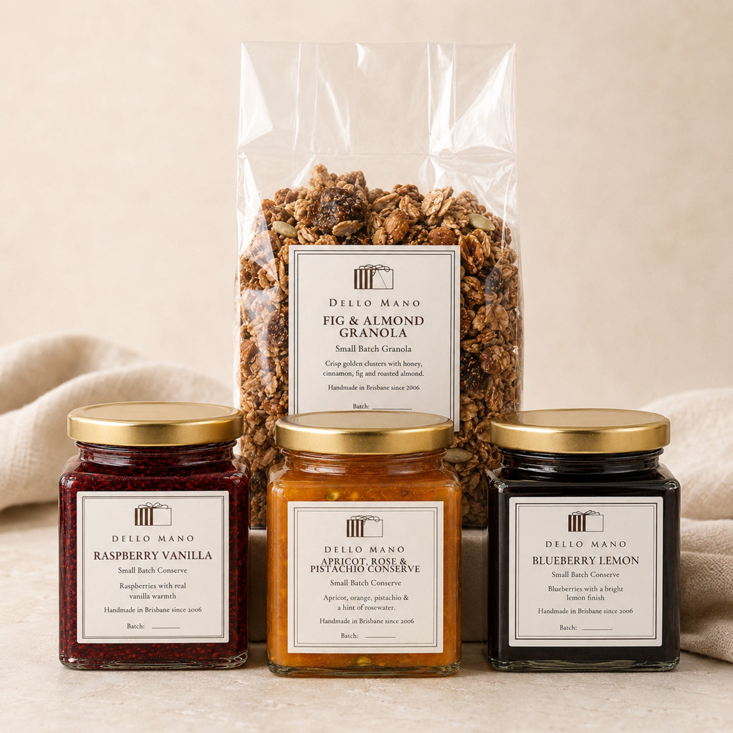Dello Mano Breakfast Table Gift with three handmade fruit preserves and Fig & Almond Granola