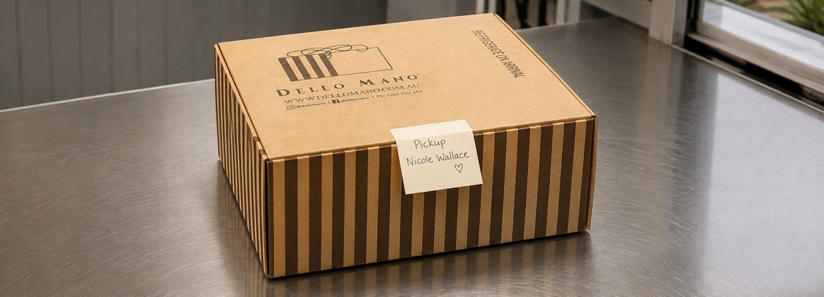 Boxed Dello Mano handmade cake ready for pickup in Brisbane