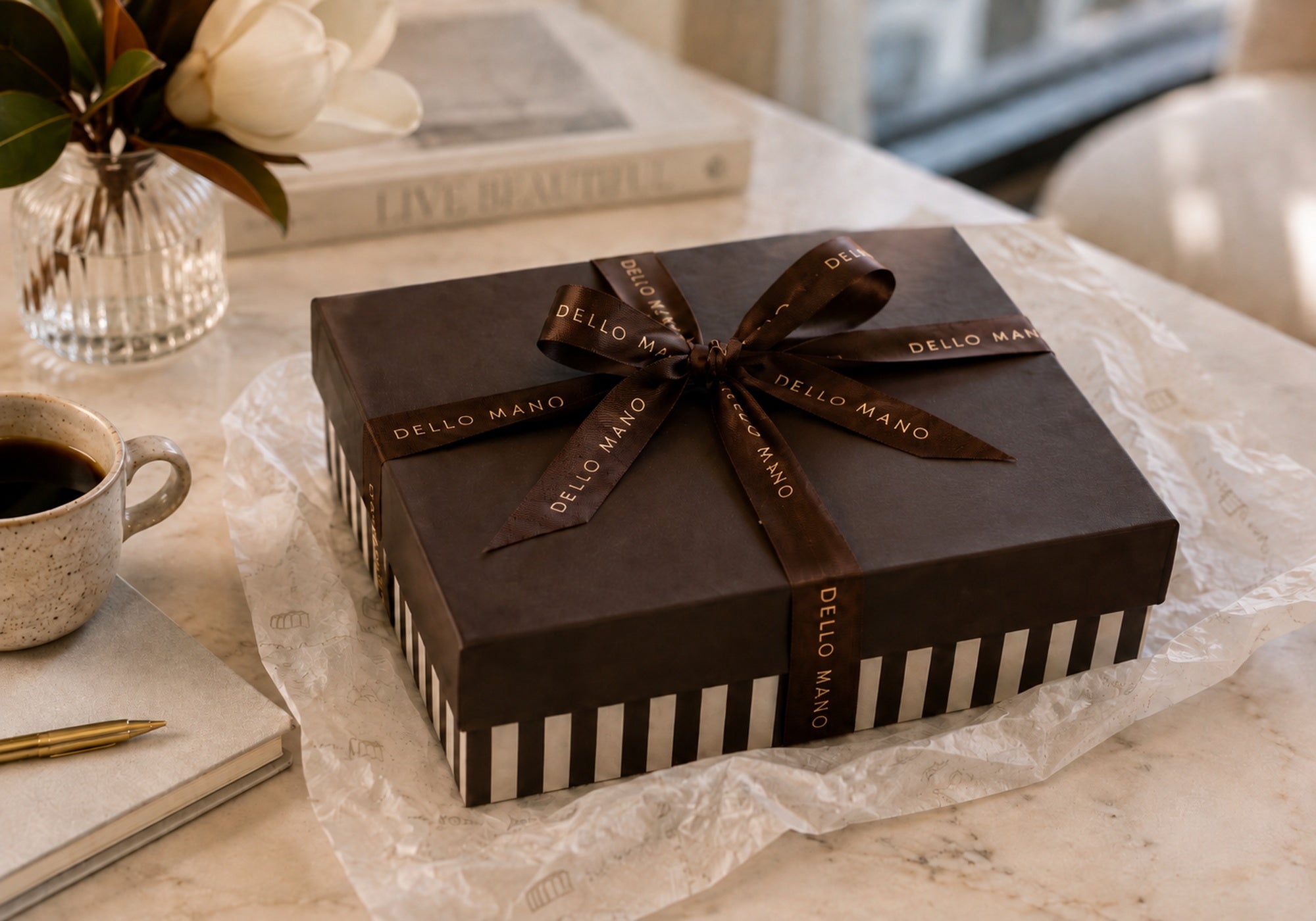 Dello Mano chocolate gift box with branded ribbon, beautifully presented after delivery to Sydney.