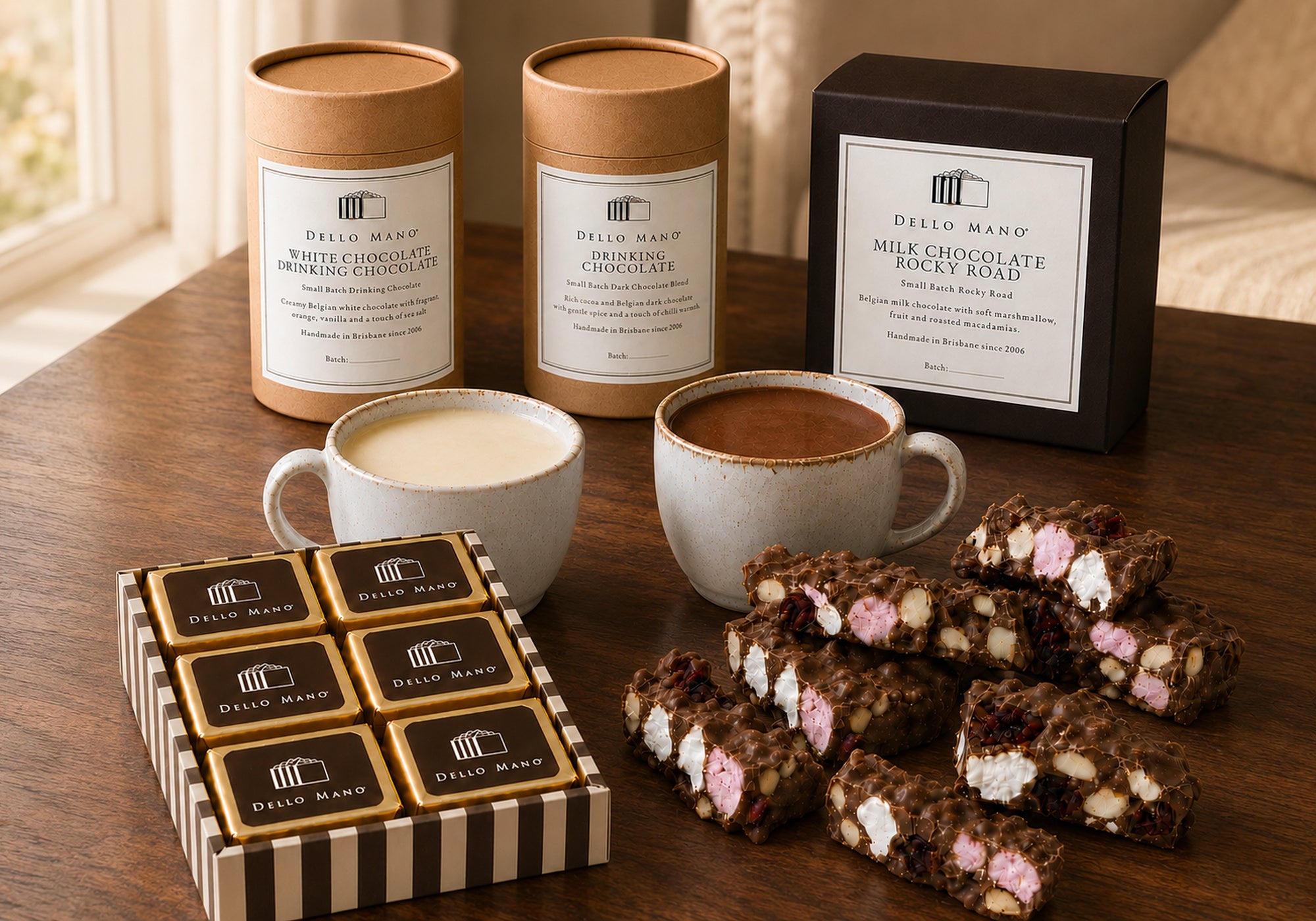 Dello Mano Chocolate Moments Hamper selection with Classic Luxury Brownies, Dark and White Drinking Chocolate and handmade Milk Chocolate Rocky Road.