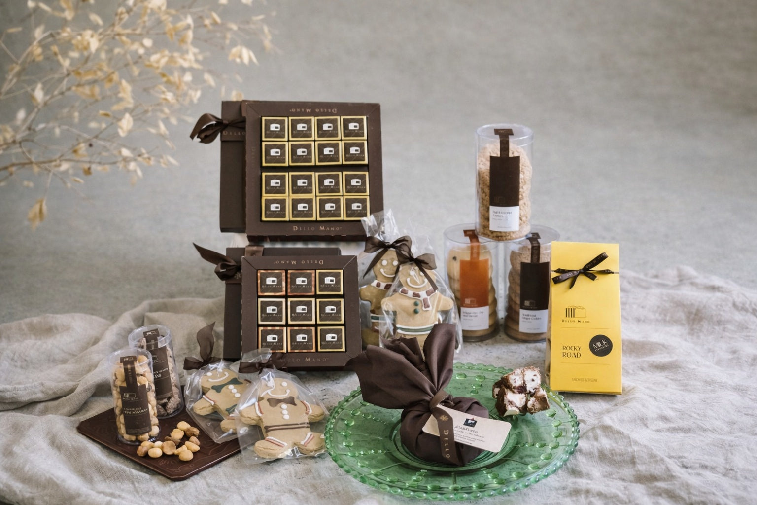 Handmade chocolate gift hamper with brownies, cookies and rocky road on soft linen background, Dello Mano Brisbane