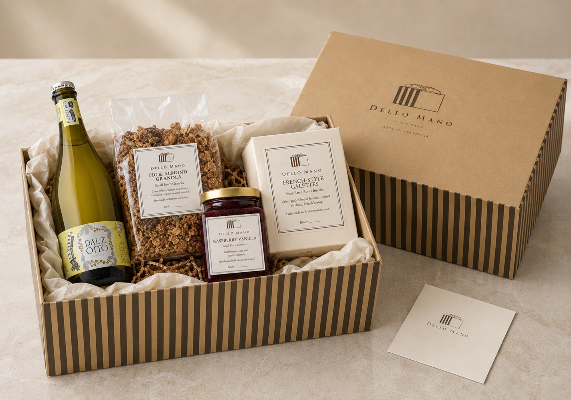 Gift-ready Dello Mano Prosecco Brunch Gift in striped presentation with a personal message card