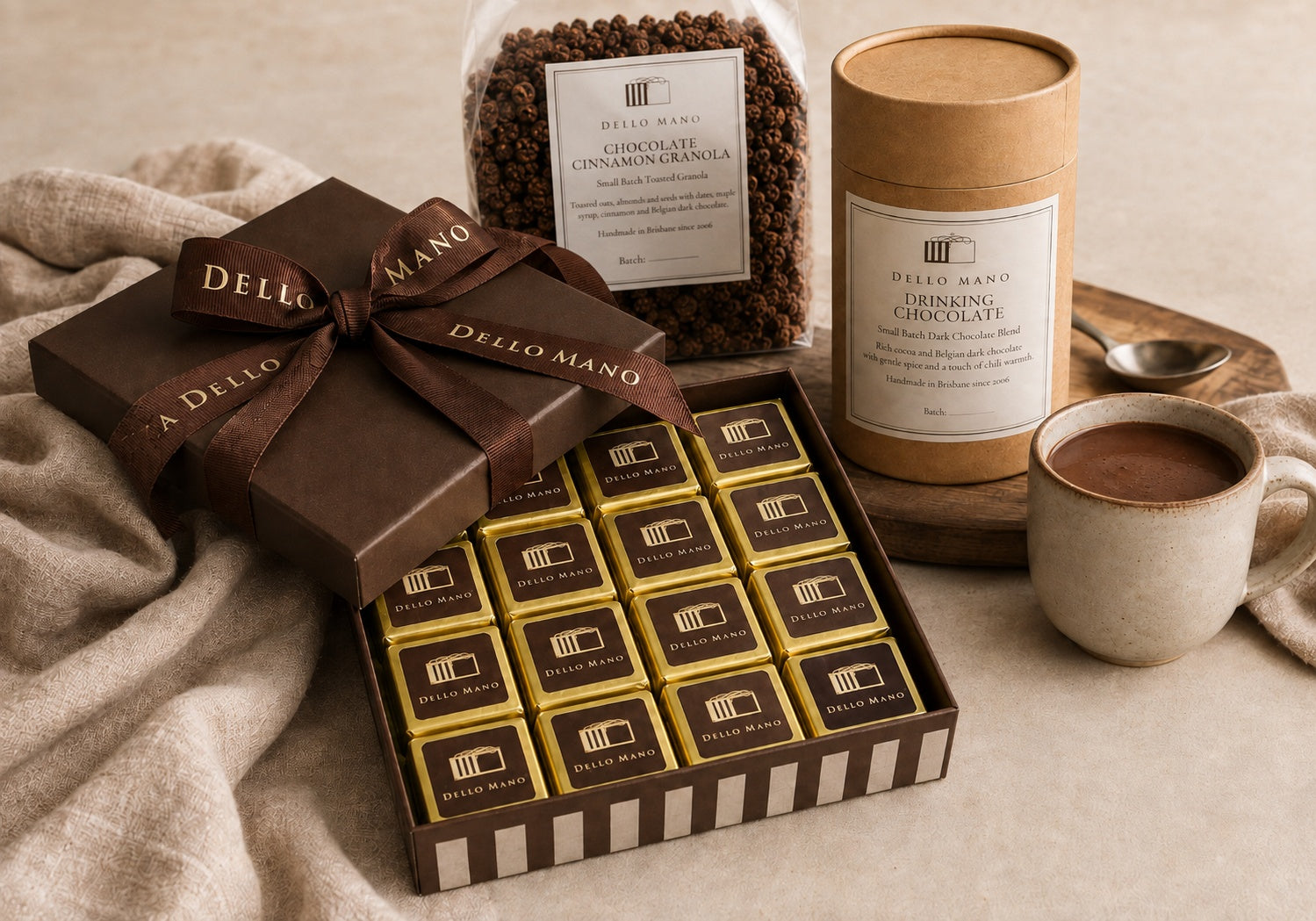 Dello Mano thank you chocolate gift with individually wrapped brownies, drinking chocolate and chocolate cinnamon granola, styled for gifting.