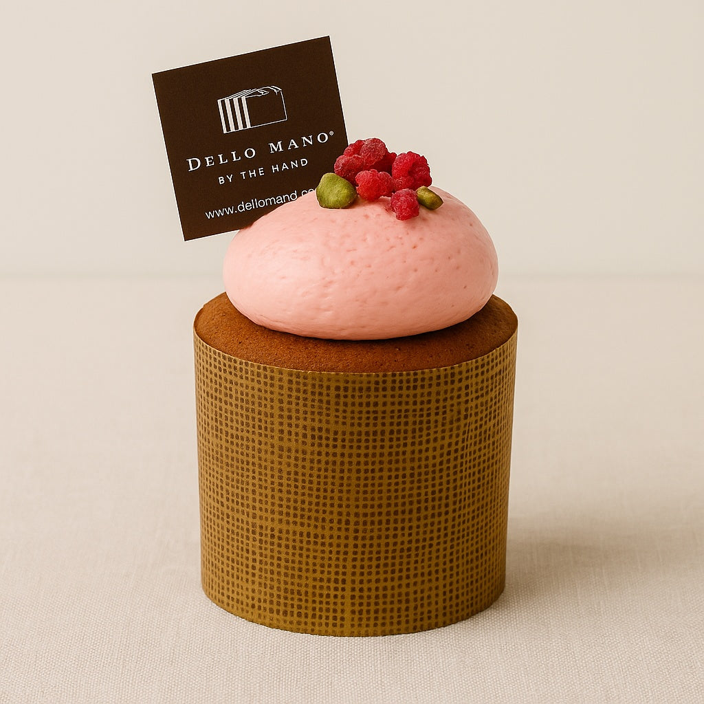 A raspberry pink bento cake, individual size from  the Dello Mano mini cake range