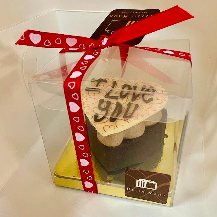 A Valentine Brownie Heart in a gift box finished with the words 