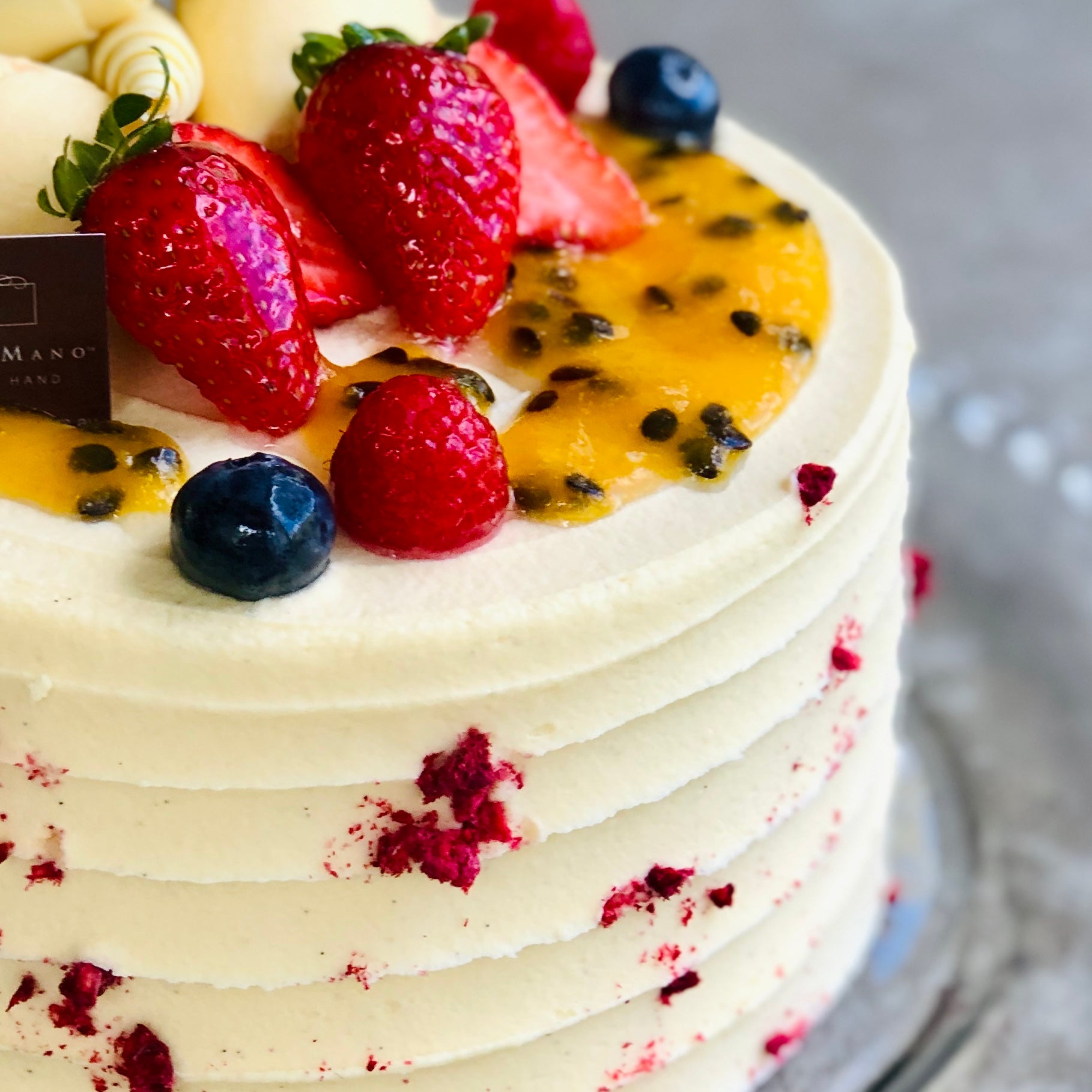Raspberry & Passionfruit Torte with Belgian White Chocolate Frosting