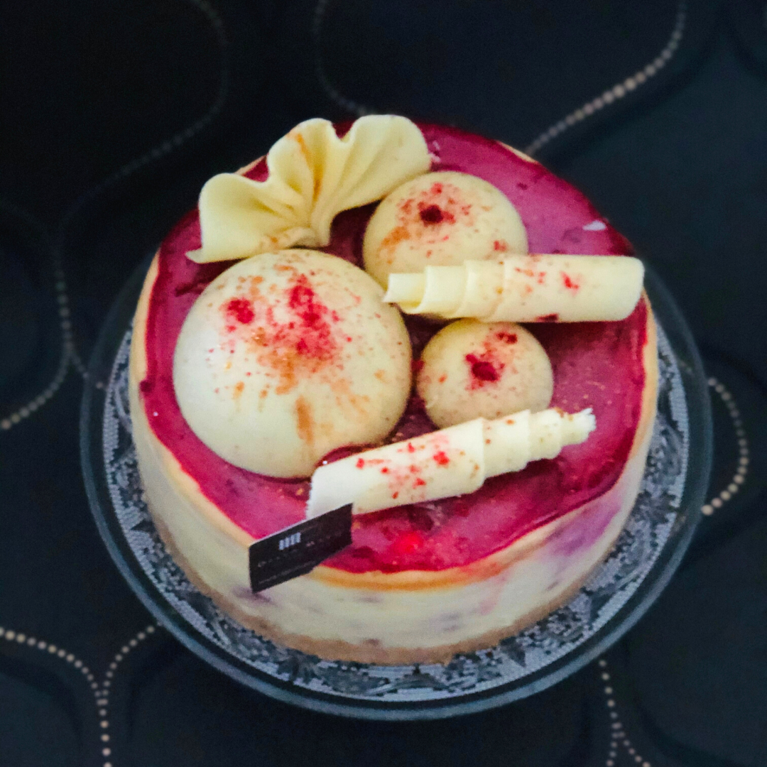 White Chocolate Raspberry Coulis Cheesecake