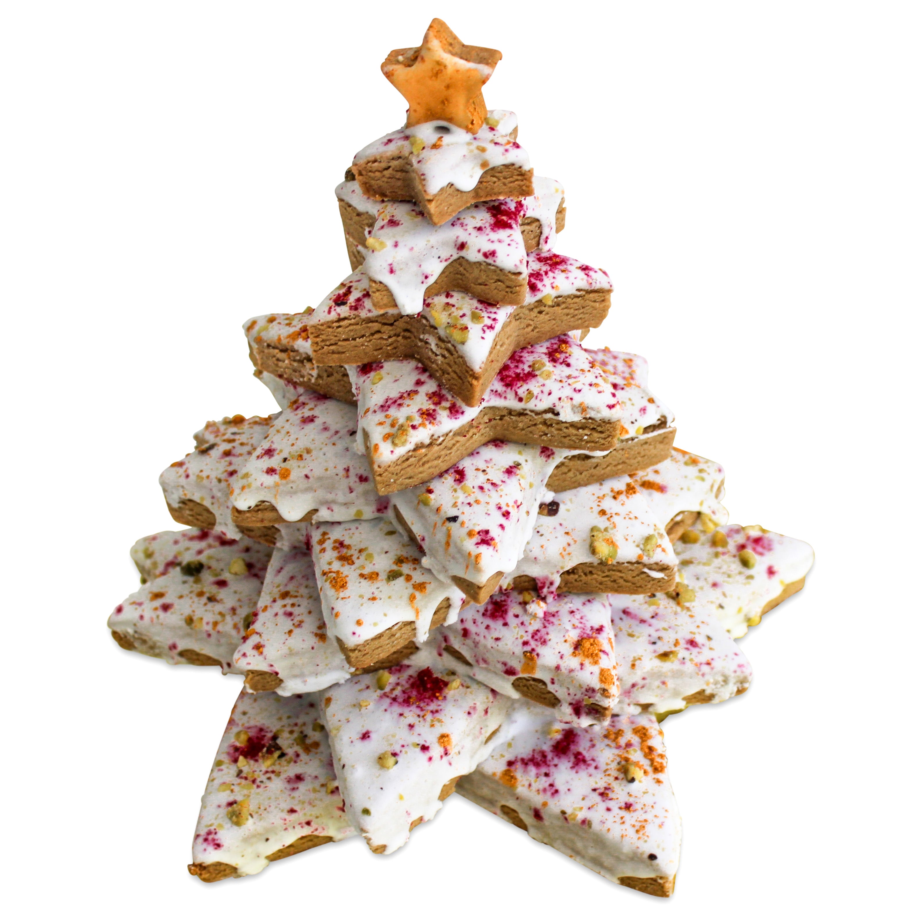 A gingerbread Christmas tree with gold star on top and spinkles of red and gold with pistachios.